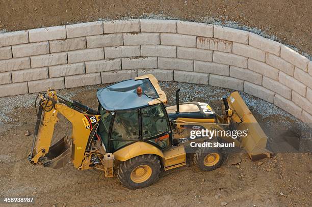 caterpillar backhoe - stödjemur bildbanksfoton och bilder