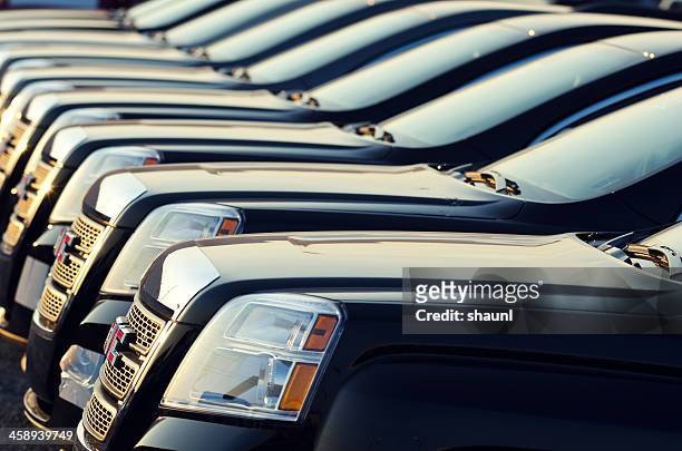 gmc envoy suvs - general motors stock pictures, royalty-free photos & images