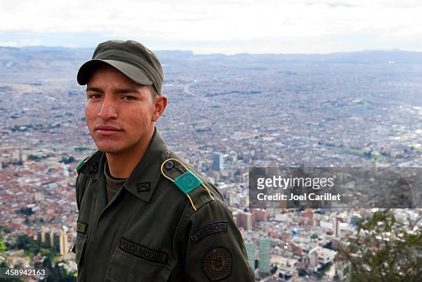 colombian police officer in bogota - colombia police stock pictures, royalty-free photos & images