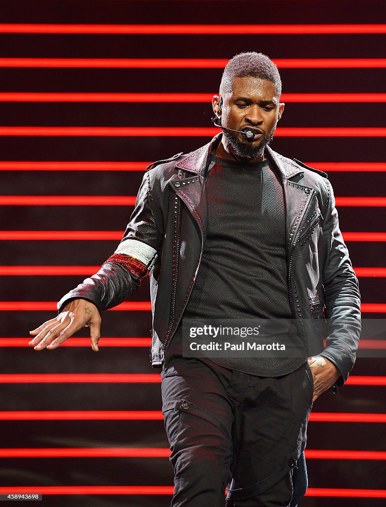 Usher performs at TD Garden on November 13, 2014 in Boston,... News