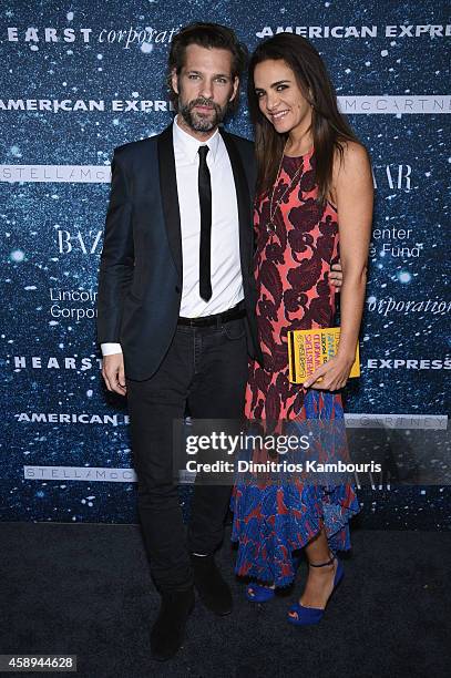 Artist Aaron Young and Laure Heriard Dubreuil attend 2014 Women's Leadership Award Honoring Stella McCartney at Alice Tully Hall at Lincoln Center on...