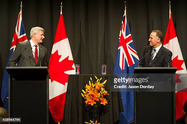 Prime Minister Of Canada Stephen Harper and Prime Minister of New Zealand John Key take part in a joint press conference at the Sky City Grand Hotel...