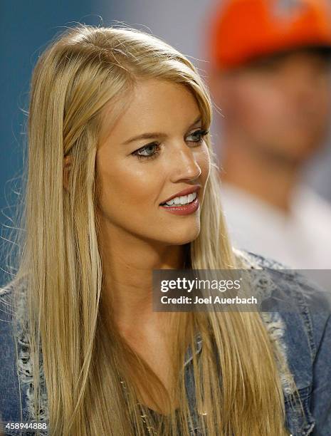 Lauren Tannehill, wife of quarterback Ryan Tannehill of the Miami Dolphins is shown on the sidelines before the Dolphins met the Buffalo Bills in a...