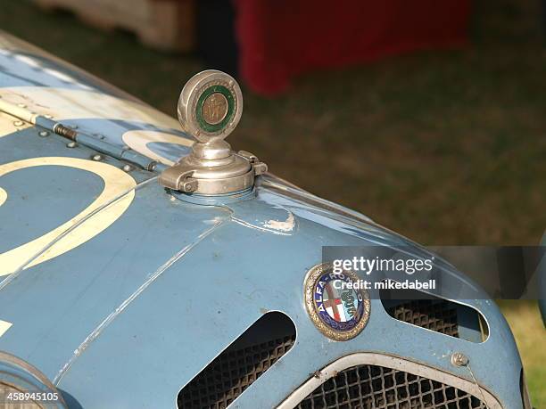 alfa romeo with st christoper mascot - hood ornament stock pictures, royalty-free photos & images