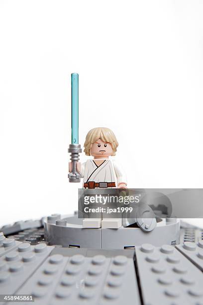lego star wars toy character: luke skywalker. - light saber stock pictures, royalty-free photos & images