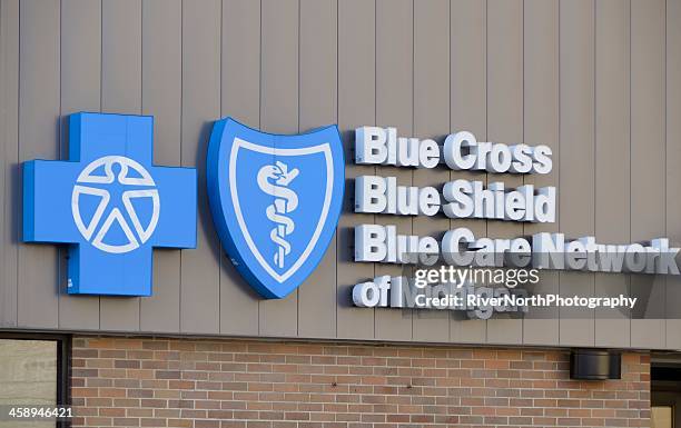 bcbs association - cross shape stock pictures, royalty-free photos & images