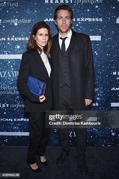 Creative Director for Revlon Gucci Westman and fashion designer David Neville attend 2014 Women's Leadership Award Honoring Stella McCartney at Alice...