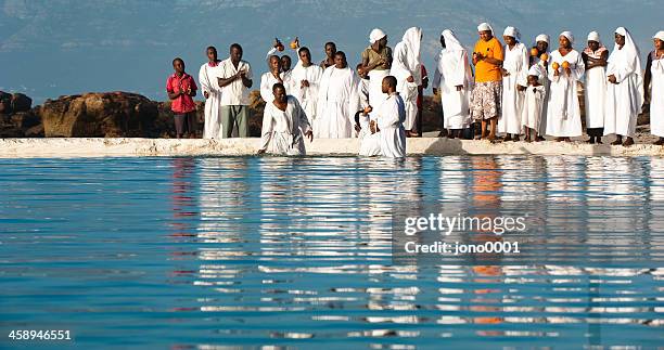 baptism ritual - baptism stock pictures, royalty-free photos & images