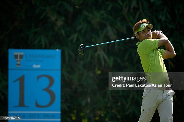 Thanyakon Khrongpha of Thailand plays a shot during round two of the Chiangmai Golf Classic at Alpine Golf Resort-Chiangmai on November 14, 2014 in...