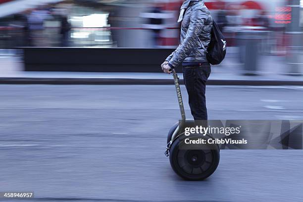 times square nyc man on segway speeding - segway stockfoto's en -beelden