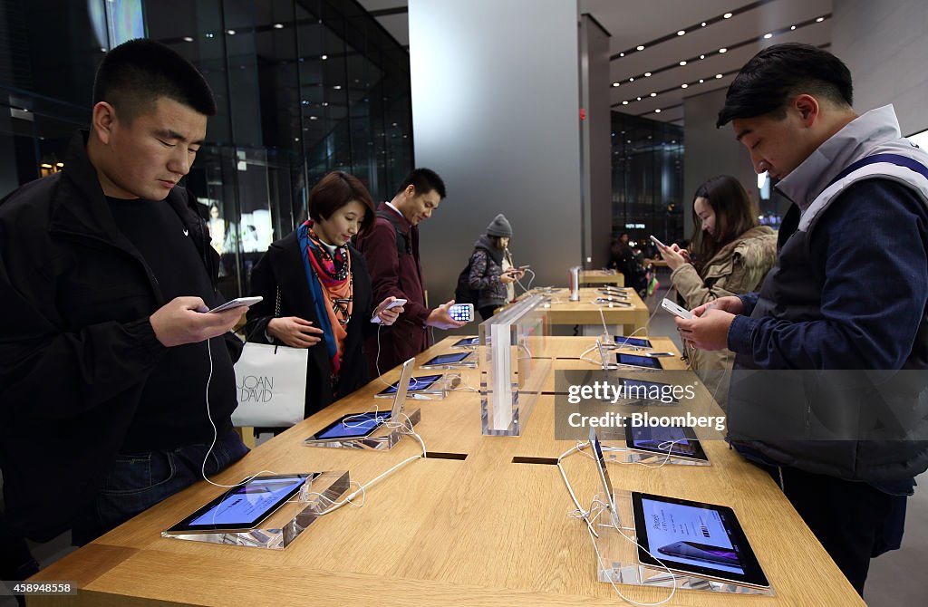 Shoppers And Product Displays Inside The Apple Inc. Store At China Central Mall