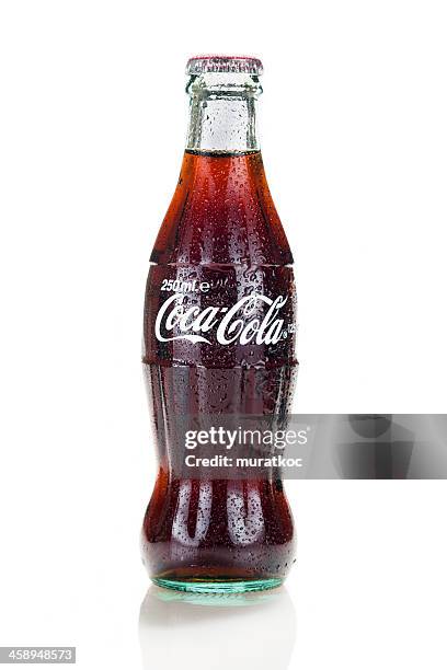 bottle of coca-cola - cola bottle stock pictures, royalty-free photos & images