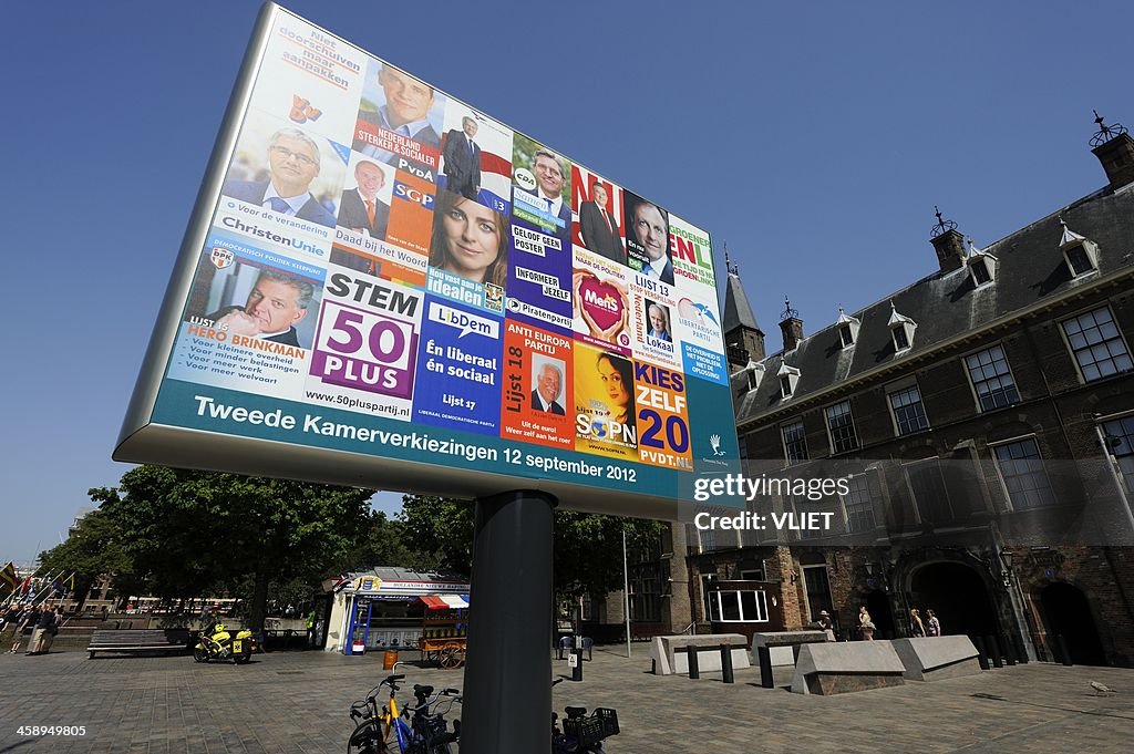 Billboard with election posters in The Hague