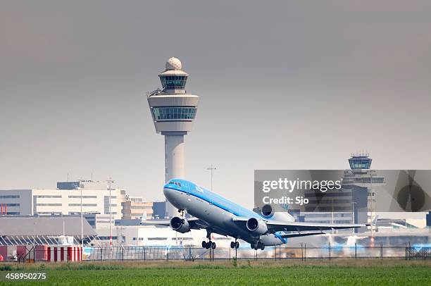 klm airplane taking off - schiphol airport the netherlands stock pictures, royalty-free photos & images