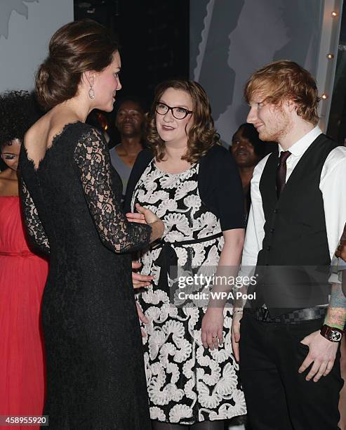 Catherine, Duchess of Cambridge meets Sarah Millican and Ed Sheeran at the end of The Royal Variety Performance at the London Palladium on November...