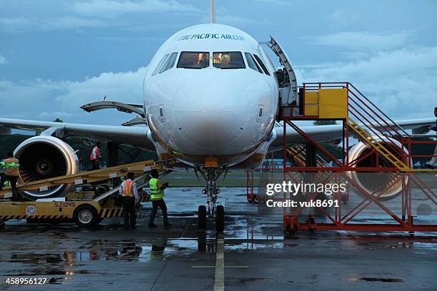 twilight at the airport in puerto princesa - a320 turbine engine stock pictures, royalty-free photos & images