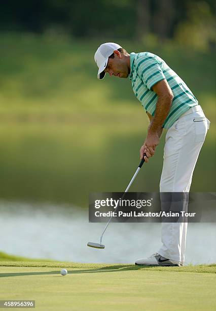 Charl Schwartzel of South Africa plays a shot during round two of the Chiangmai Golf Classic at Alpine Golf Resort-Chiangmai on November 14, 2014 in...