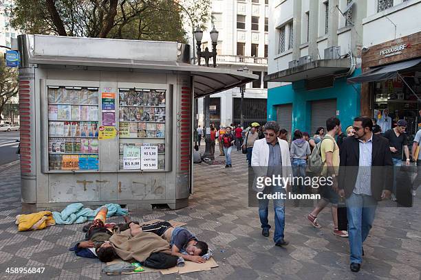beggars sleeping in the streets - sao paulo - beggar stock pictures, royalty-free photos & images