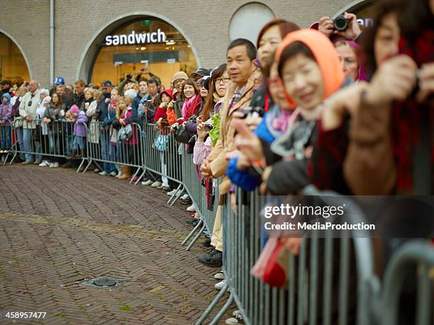 spectators at dutch cheese market show - cheese production in netherlands stock pictures, royalty-free photos & images