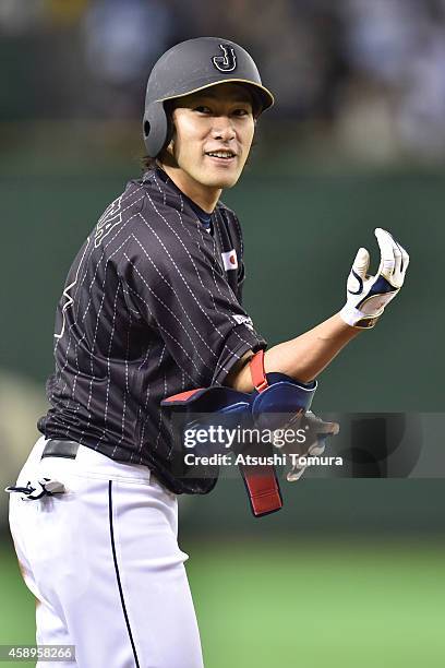 Yuki Yanagita of Samurai Japan hits an RBI tripple in the second inning during the game two of Samurai Japan and MLB All Stars at Tokyo Dome on...