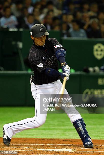 Hikaru Ito of Samurai Japan hits a single to the center field in the fourth inning during the game two of Samurai Japan and MLB All Stars at Tokyo...