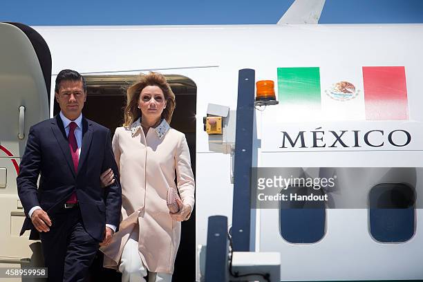 In this handout photo provided by the G20 Australia, Mexico's President Enrique Pena Nieto and First Lady Angelica Rivera Hurtado arrive at G20...