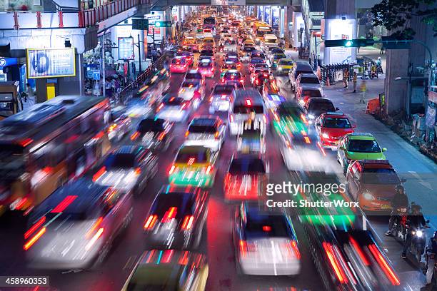 bangkok city traffic @ night - bts skytrain stock pictures, royalty-free photos & images
