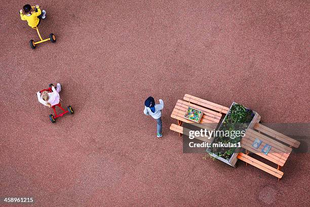 children playing - aerial view of childs playground stock pictures, royalty-free photos & images