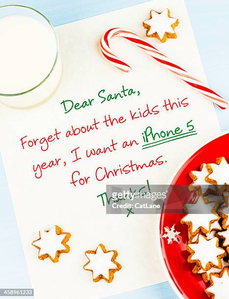 parent's letter to santa: i want an iphone 5 - claus lange stock pictures, royalty-free photos & images