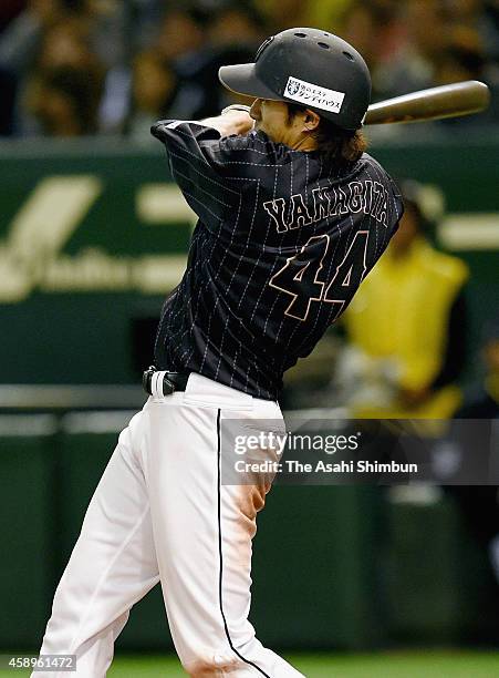 Yuki Yanagita of Samurai Japan hits a RBI single in the top of 4th inning during the game two of Samurai Japan and MLB All Stars at Tokyo Dome on...