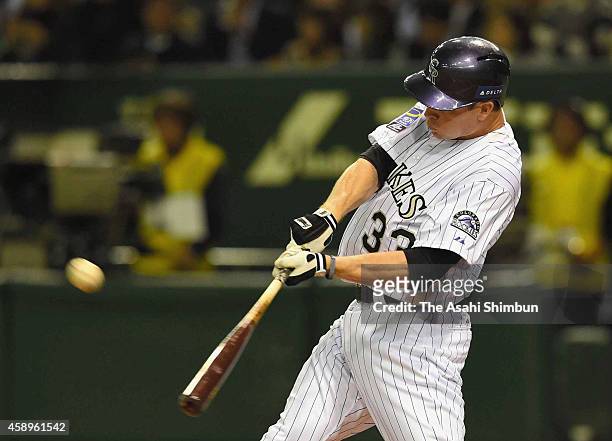 Justin Morneau of the Colorado Rockies hits a two-run homer in the bottom of 2nd inning during the game two of Samurai Japan and MLB All Stars at...