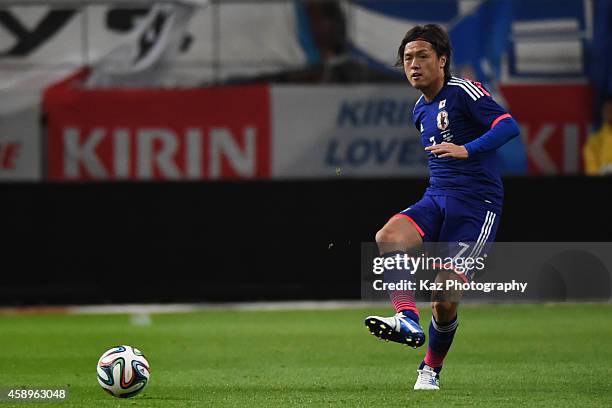 Yasuhito Endo of Japan passes the ball during the international friendly match between Japan and Honduras at Toyota Stadium on November 14, 2014 in...