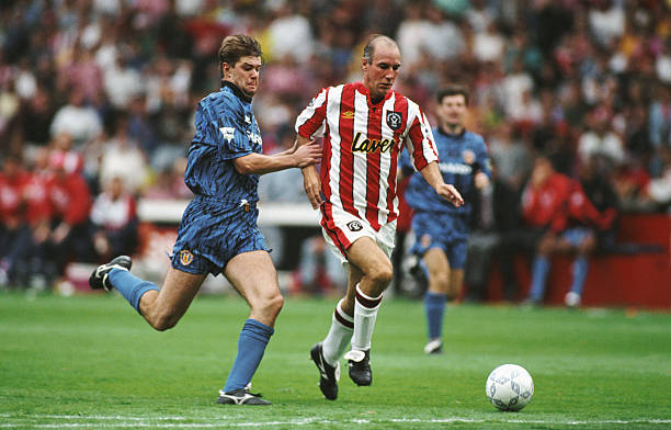 Sheffield United forward Alan Cork outpaces Gary Pallister of Manchester United during the first round of FA Premier League games at Bramall Lane on...