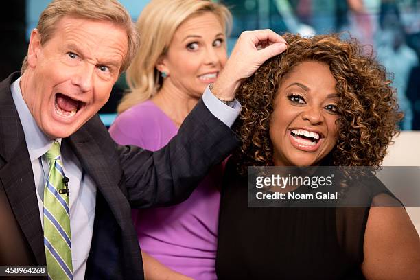 Steve Doocy, Elisabeth Hasselbeck and Sherri Shepherd pose on set as host Elisabeth Hasselbeck returns to FOX and Friends at FOX Studios on November...