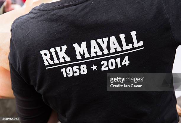 Fan wears a t-shirt as a memorial bench for the late Rik Mayall is unveiled on November 14, 2014 in London, England.