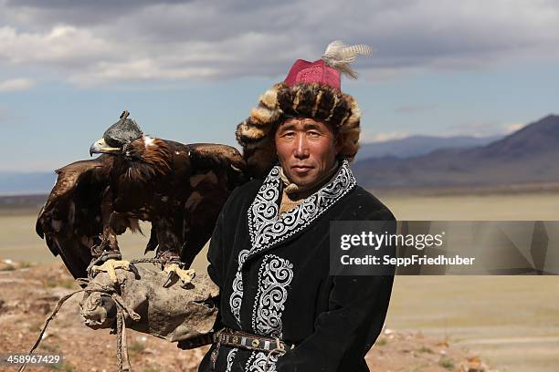 mongolian eagle hunter - kazakhstan steppe stock pictures, royalty-free photos & images