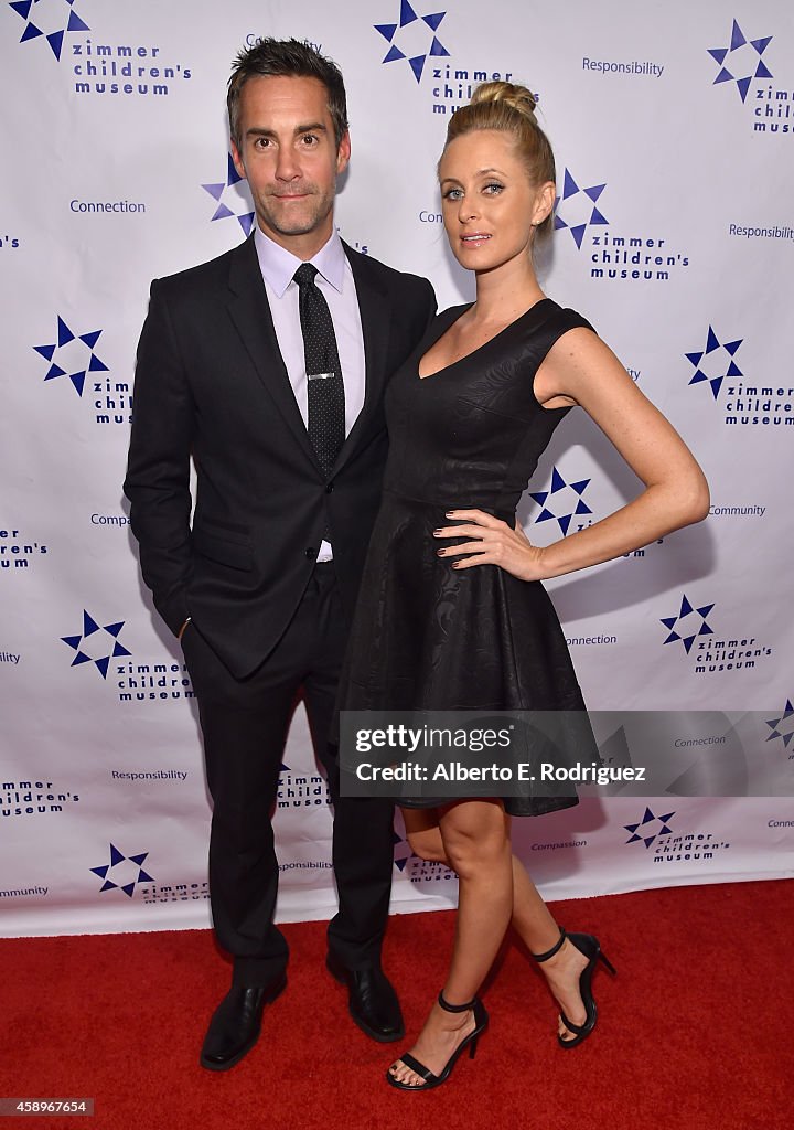Actor Jay Harrington and Monica Richards attend The Zimmer Children's