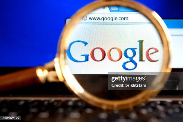 google website through a magnifying glass - google search stock pictures, royalty-free photos & images