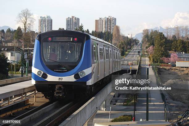 vancouver's skytrain on the canada line, marine drive station - vancouver train stock pictures, royalty-free photos & images