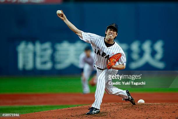 Kenta Maeda of Samurai Japan pitches in the second inning against the MLB All-Stars at the Kyocera Dome during the Japan All-Star Series on...