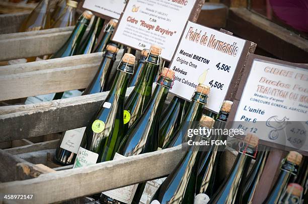 french wine market - calvados brandy stock pictures, royalty-free photos & images