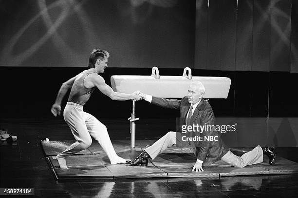 Pictured: Olympic gymnast Kurt Thomas and host Johnny Carson on May 10, 1990 --
