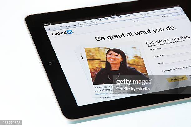 linkedin page on  apple ipad2 - linkedin stock pictures, royalty-free photos & images