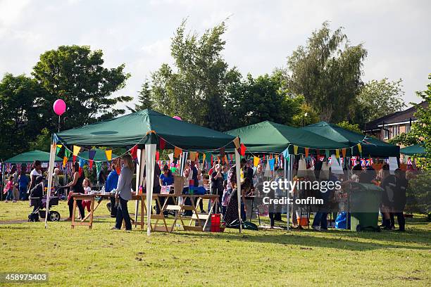 jubilee party, gazebos, flags and bunting - garden fete stock pictures, royalty-free photos & images