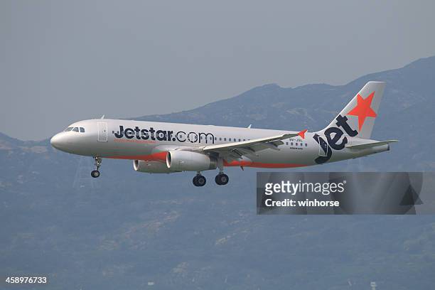 jetstar airways airbus a320 - jetstar stockfoto's en -beelden