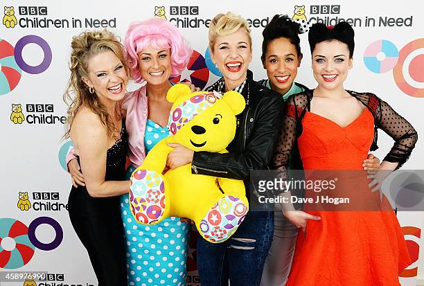 Kellie Bright, Luisa Bradshaw-White, Maddy Hill, Rebecca Scroggs and Shona McGarty after performing "Grease-Enders" backstage at the Star Bar during...
