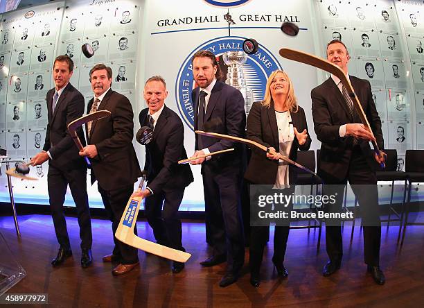Hockey Hall of Fame inductees Mike Modano, Bill McCreary, Dominik Hasek, Peter Forsberg, Line Gignac Burns , and Rob Blake, take part in a photo...