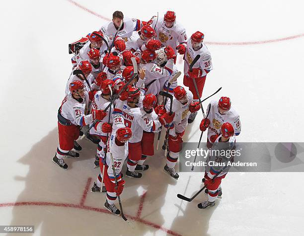 Team Russia celebrate their win against Team OHL during the 2014 Subway Super Series at the Peterborough Memorial Centre on November 13, 2014 in...