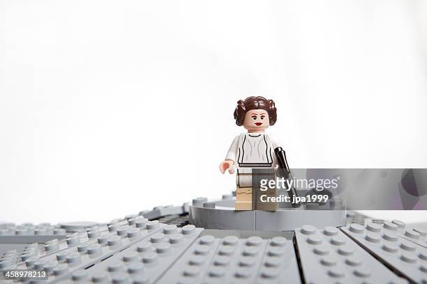 lego star wars toy character: princess leia organa - guy playing with lego stock pictures, royalty-free photos & images