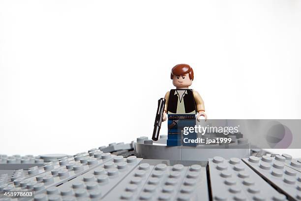 lego star wars toy character: han solo - guy playing with lego stock pictures, royalty-free photos & images